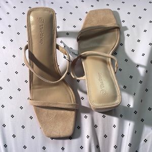 Light pink polyester heels